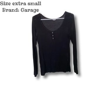 Mint condition black long sleeve from Garage.